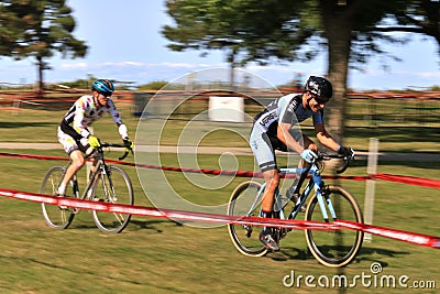 Fast moving Cycling Racers on the course Editorial Stock Photo